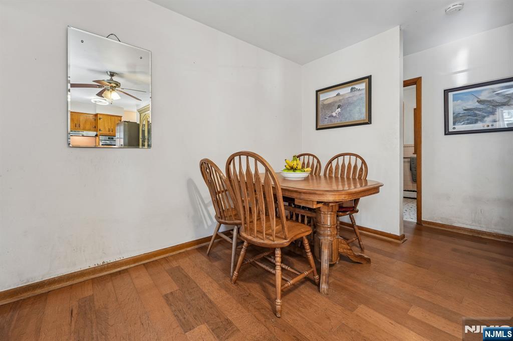 140 Francisco Avenue Rutherford, NJ 07070 - Photo 8 of 25 a dining room with furniture and wooden floor