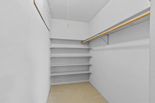 a kitchen with stainless steel appliances a refrigerator sink and cabinets