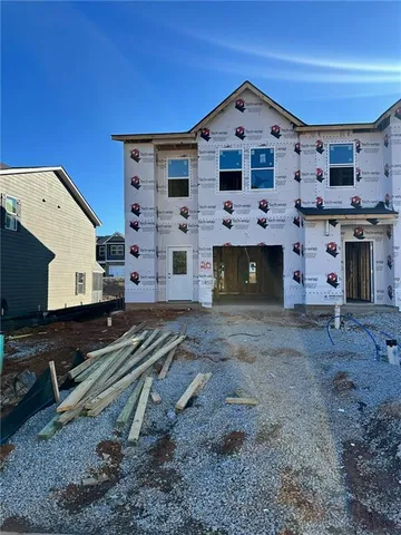 a large white building with a large window