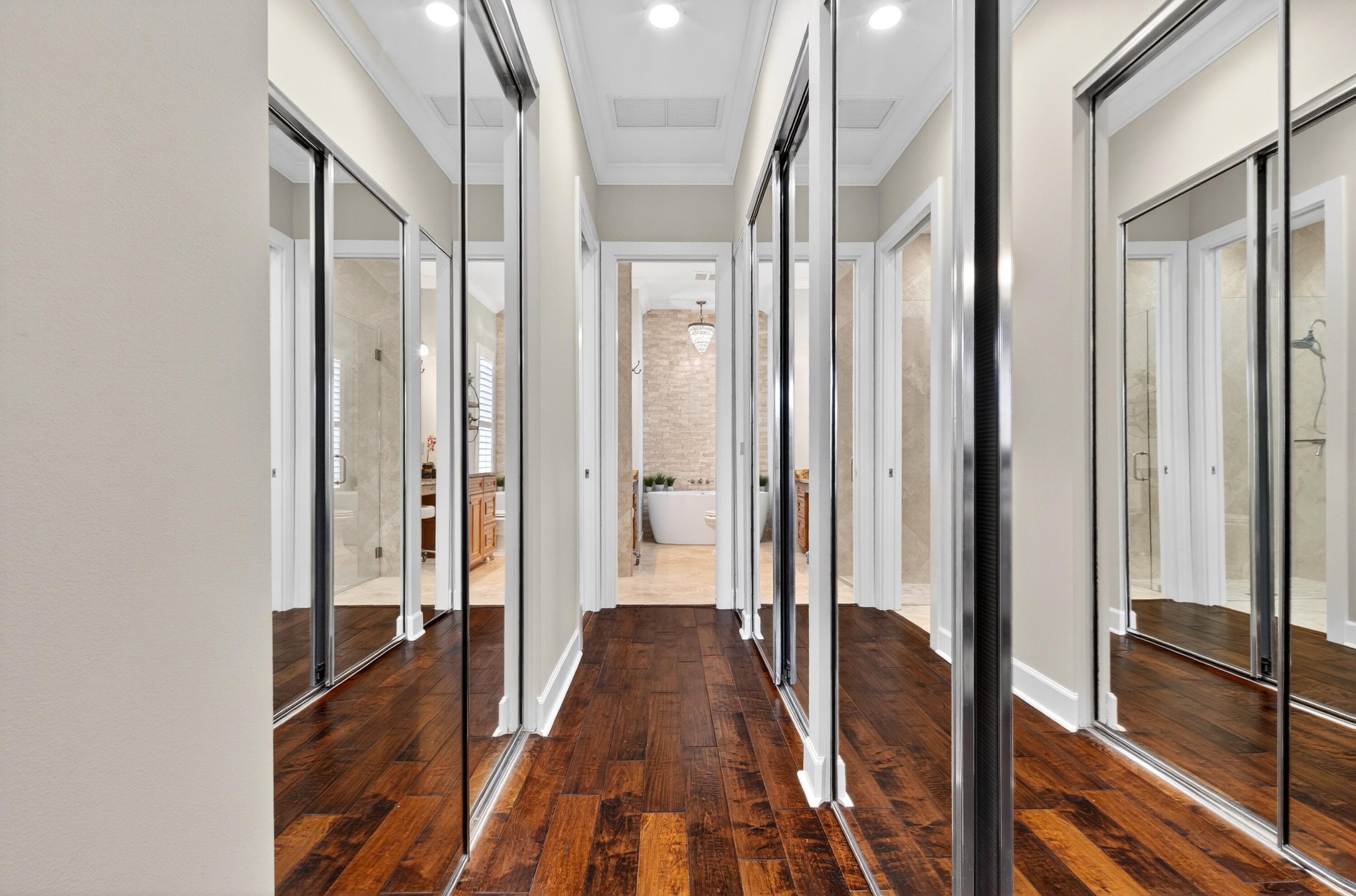 8223 Pine Cay Road Wellington, FL 33414 - Photo 17 of 60 a view of a hallway with wooden floor and staircase
