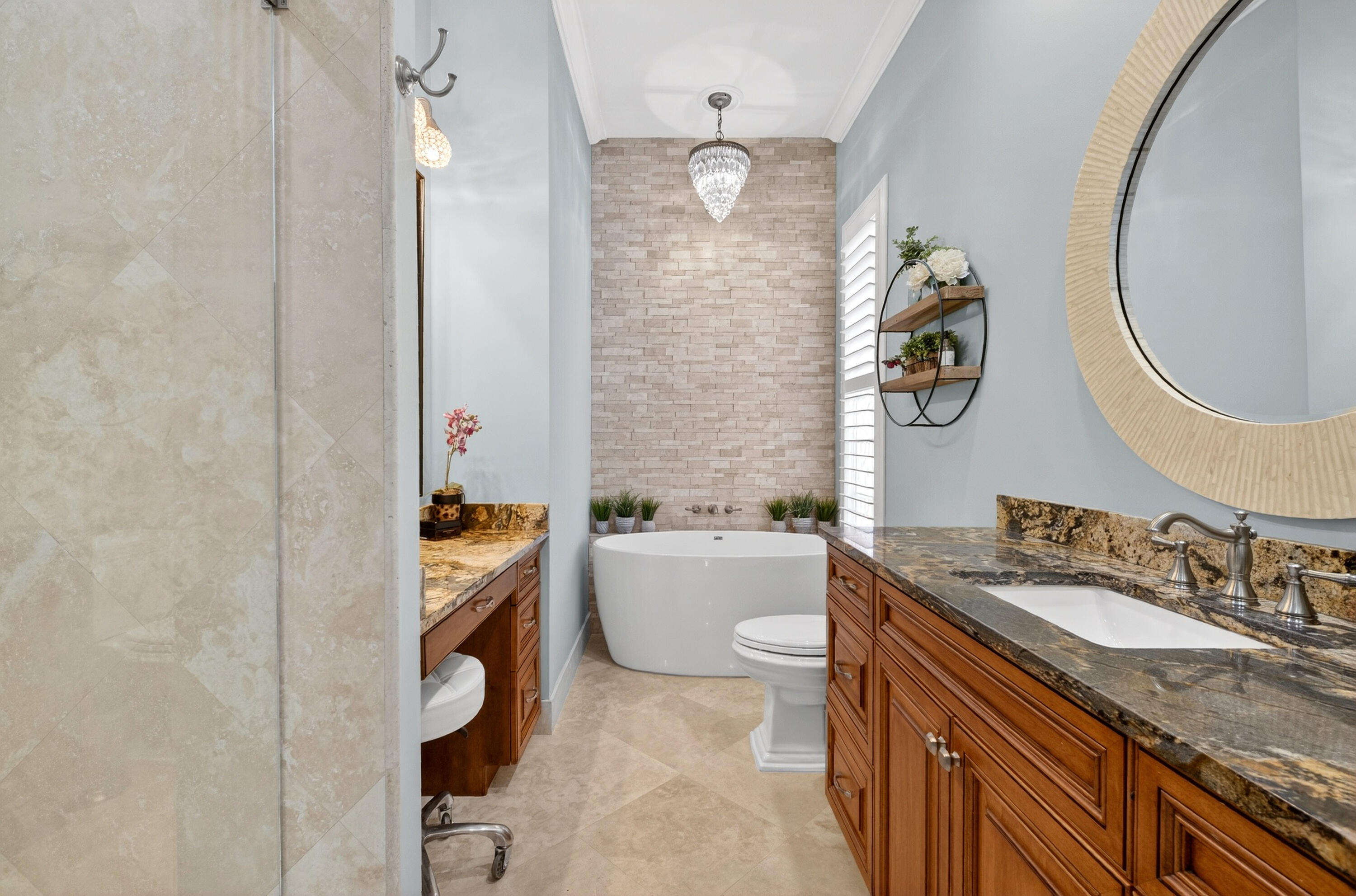 8223 Pine Cay Road Wellington, FL 33414 - Photo 18 of 60 a bathroom with a granite countertop sink and a mirror