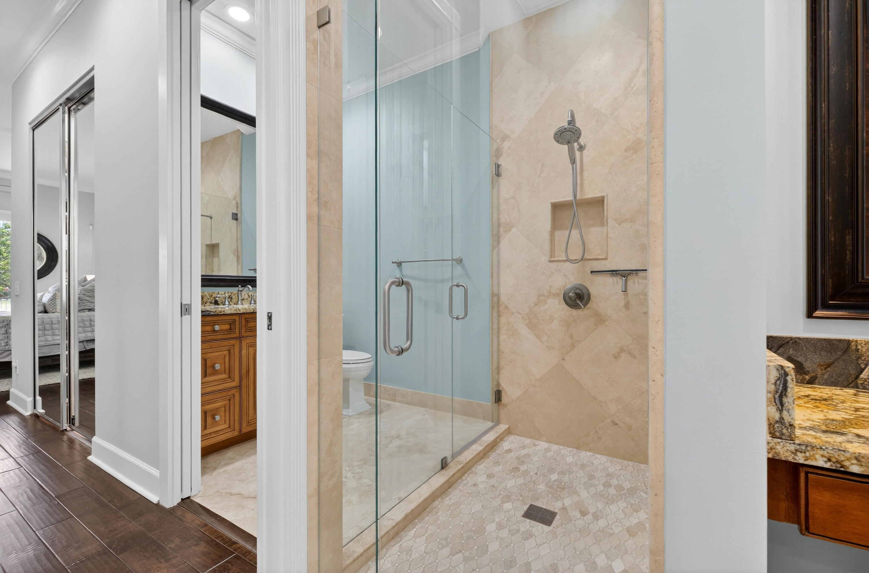 8223 Pine Cay Road Wellington, FL 33414 - Photo 21 of 60 a bathroom with a glass shower door