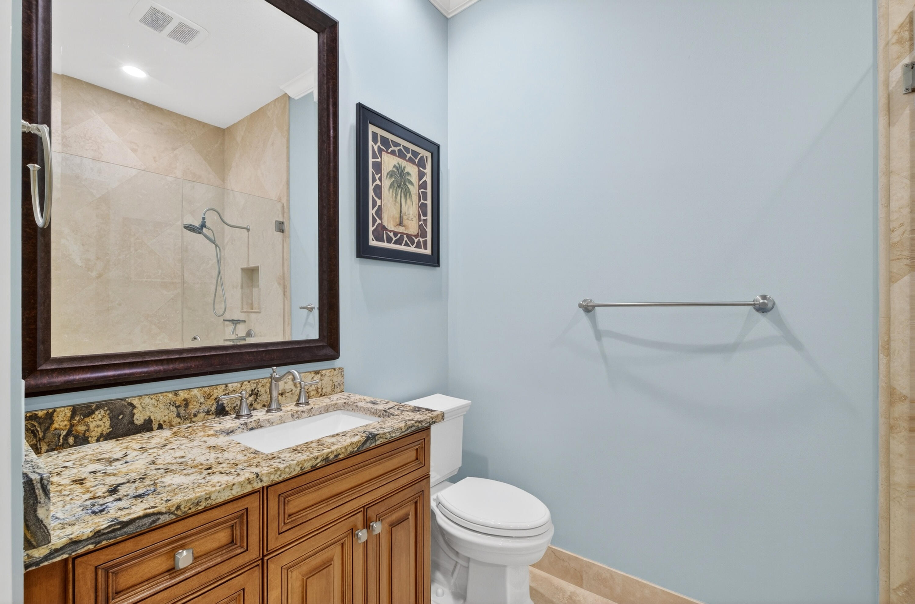 8223 Pine Cay Road Wellington, FL 33414 - Photo 22 of 60 a bathroom with a granite countertop sink and a toilet