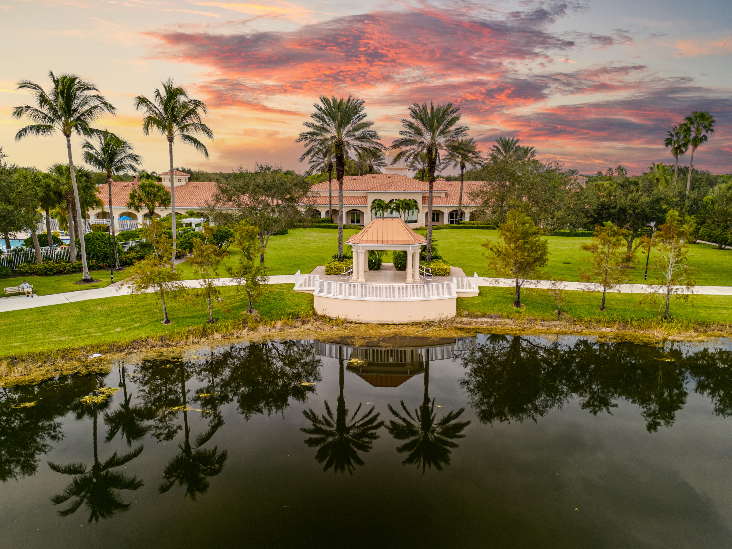 8223 Pine Cay Road Wellington, FL 33414 - Photo 35 of 60 a view of a lake with a big yard