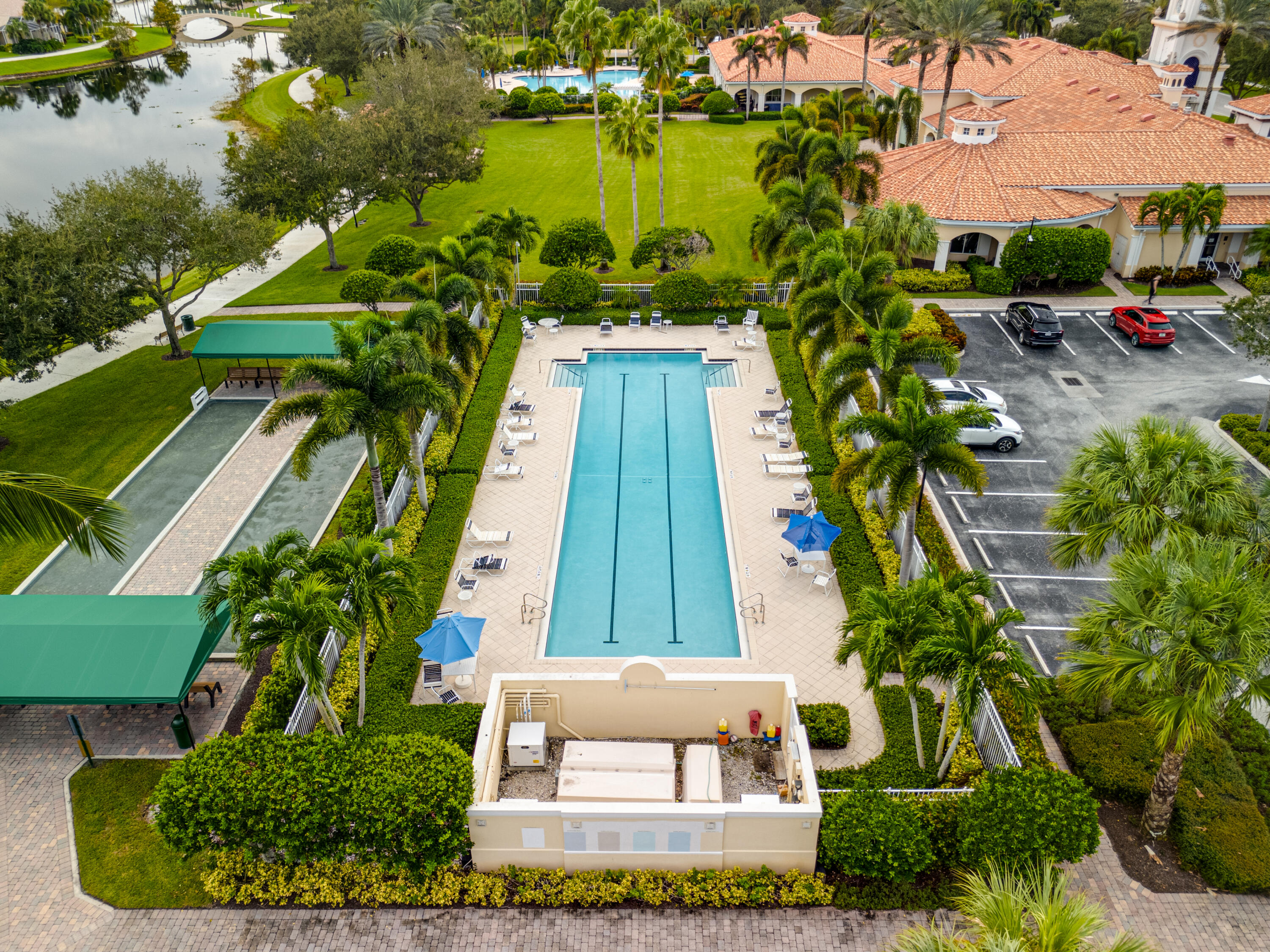 8223 Pine Cay Road Wellington, FL 33414 - Photo 51 of 60 an aerial view of a house with a yard and lake view