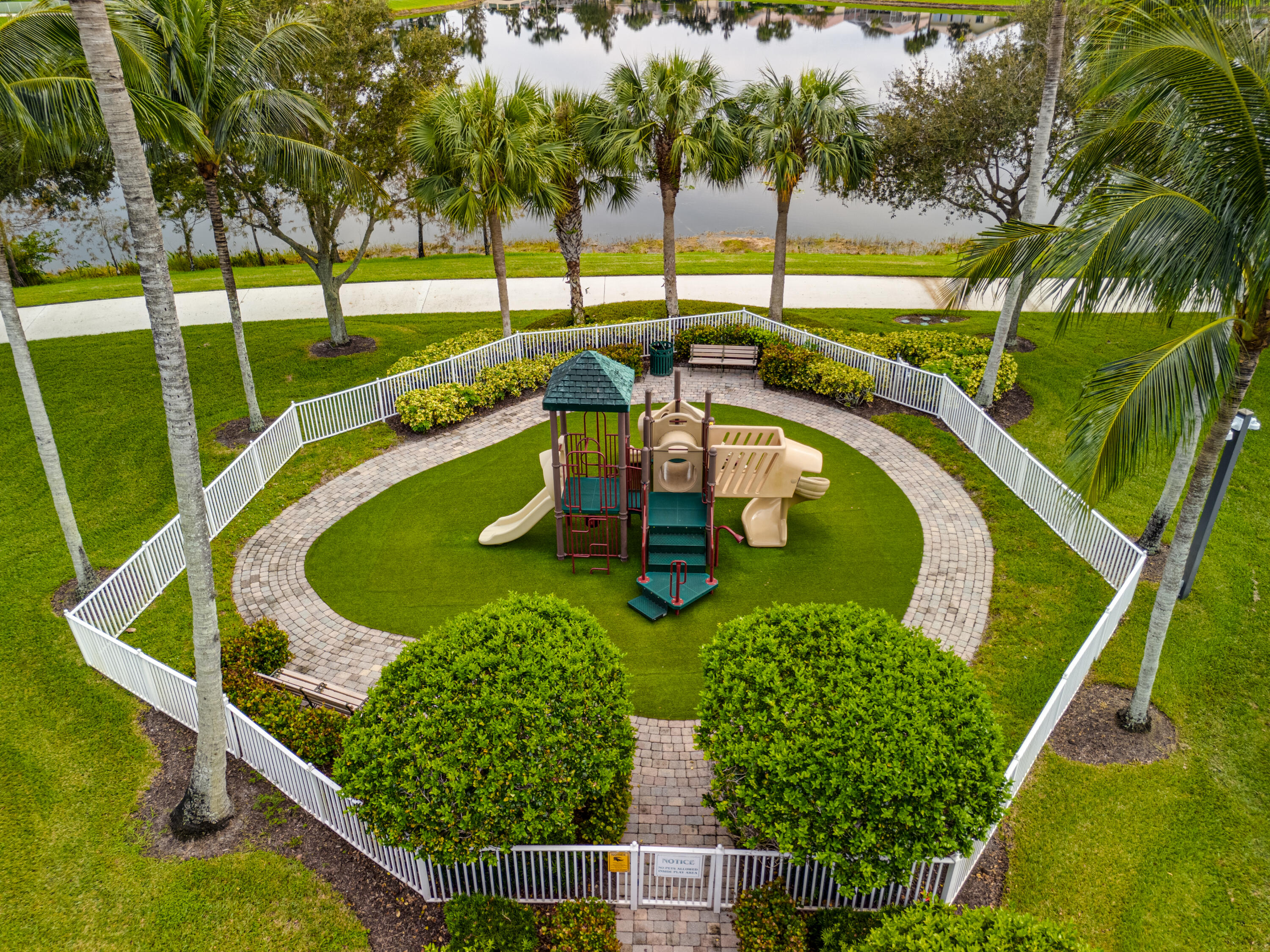 8223 Pine Cay Road Wellington, FL 33414 - Photo 52 of 60 an aerial view of a house with swimming pool having outdoor seating