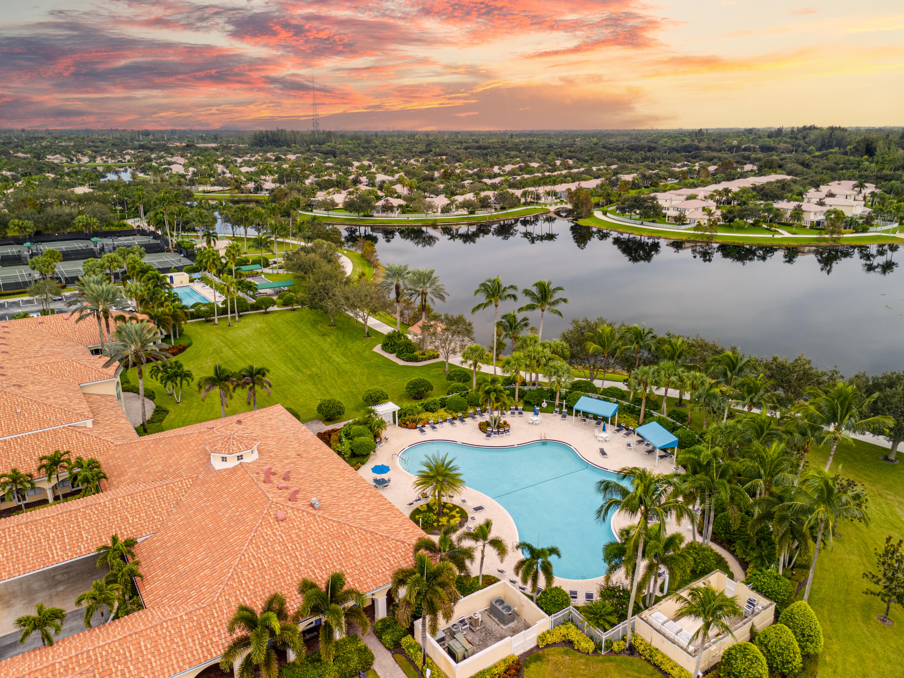 8223 Pine Cay Road Wellington, FL 33414 - Photo 57 of 60 an aerial view of lake and residential houses with outdoor space