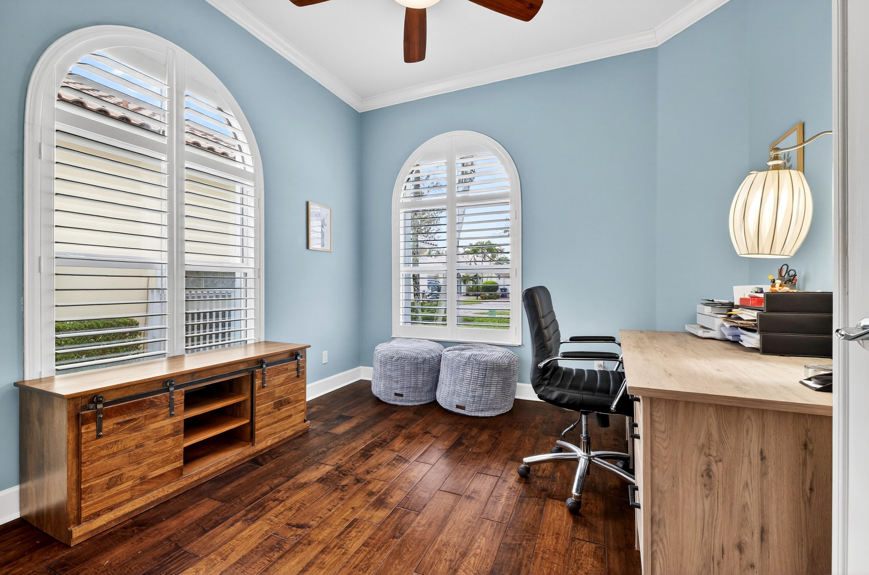 8223 Pine Cay Road Wellington, FL 33414 - Photo 8 of 60 a bedroom with furniture and a window