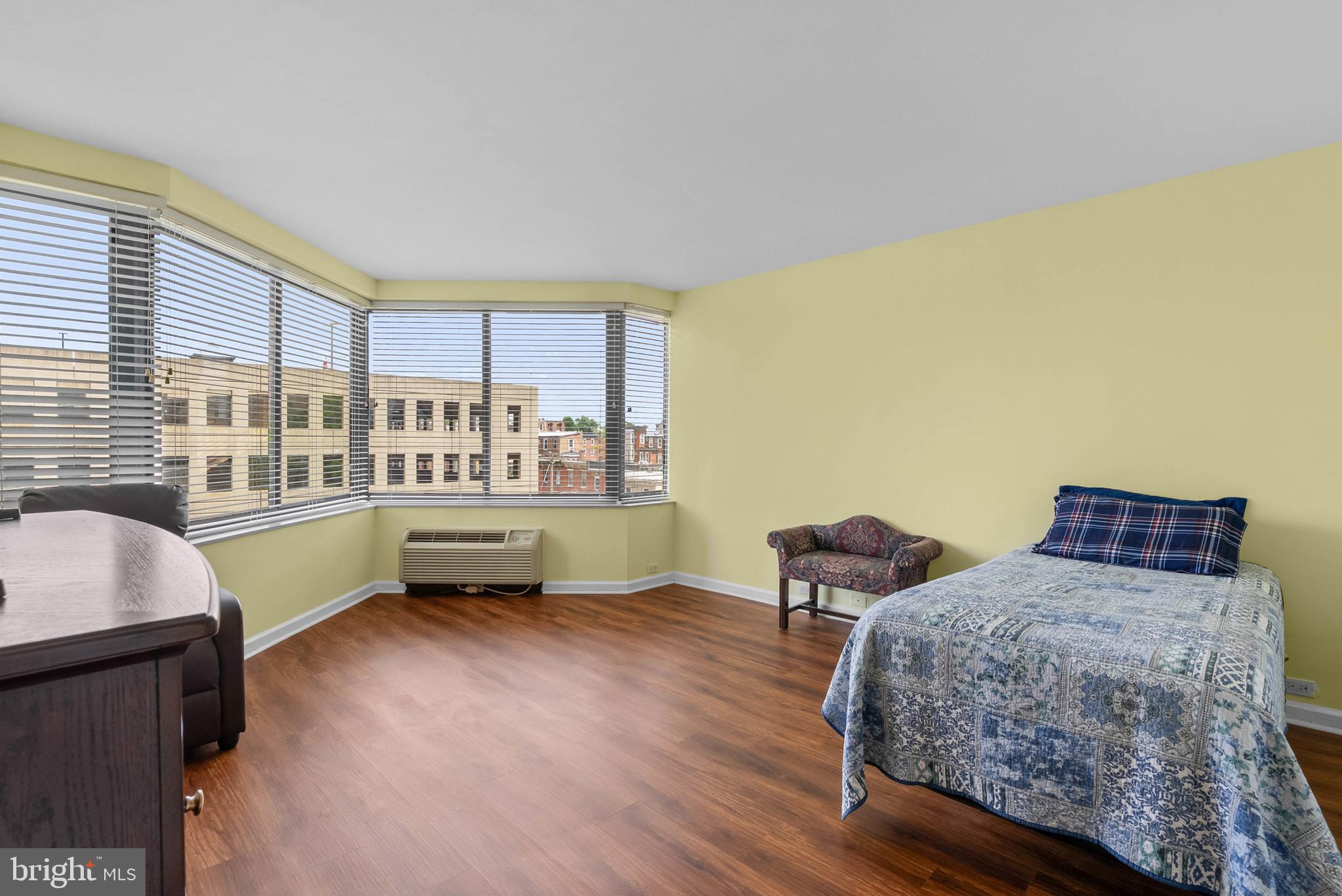 2001 Hamilton Street, Unit 507 Philadelphia, PA 19130 - Photo 15 of 41 a bedroom with a bed and a large window