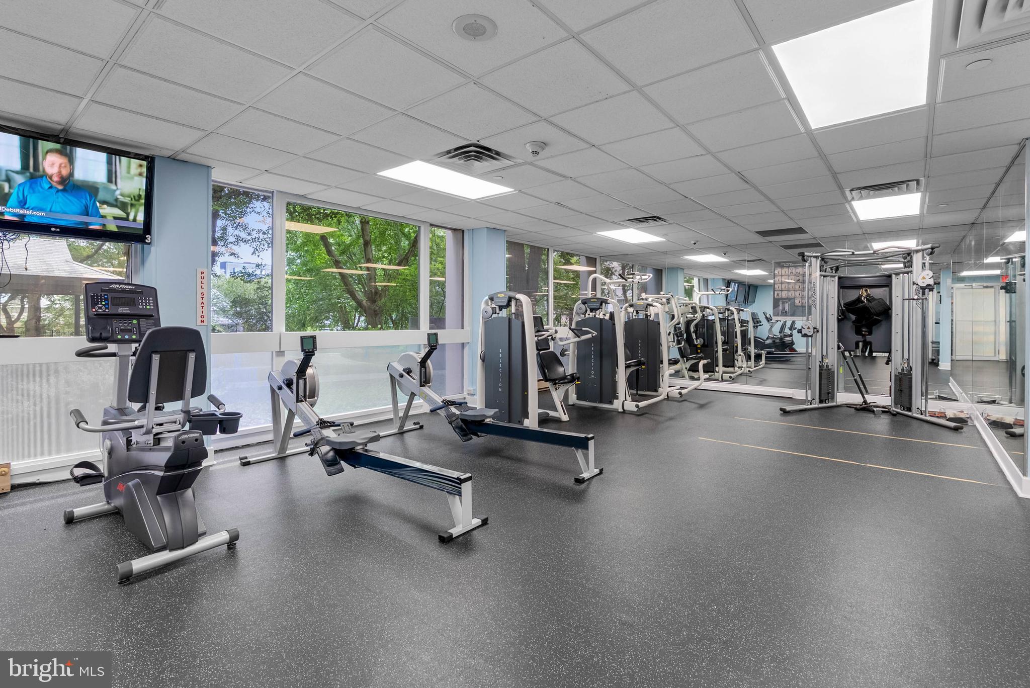 2001 Hamilton Street, Unit 507 Philadelphia, PA 19130 - Photo 29 of 41 a view of a room with gym equipment