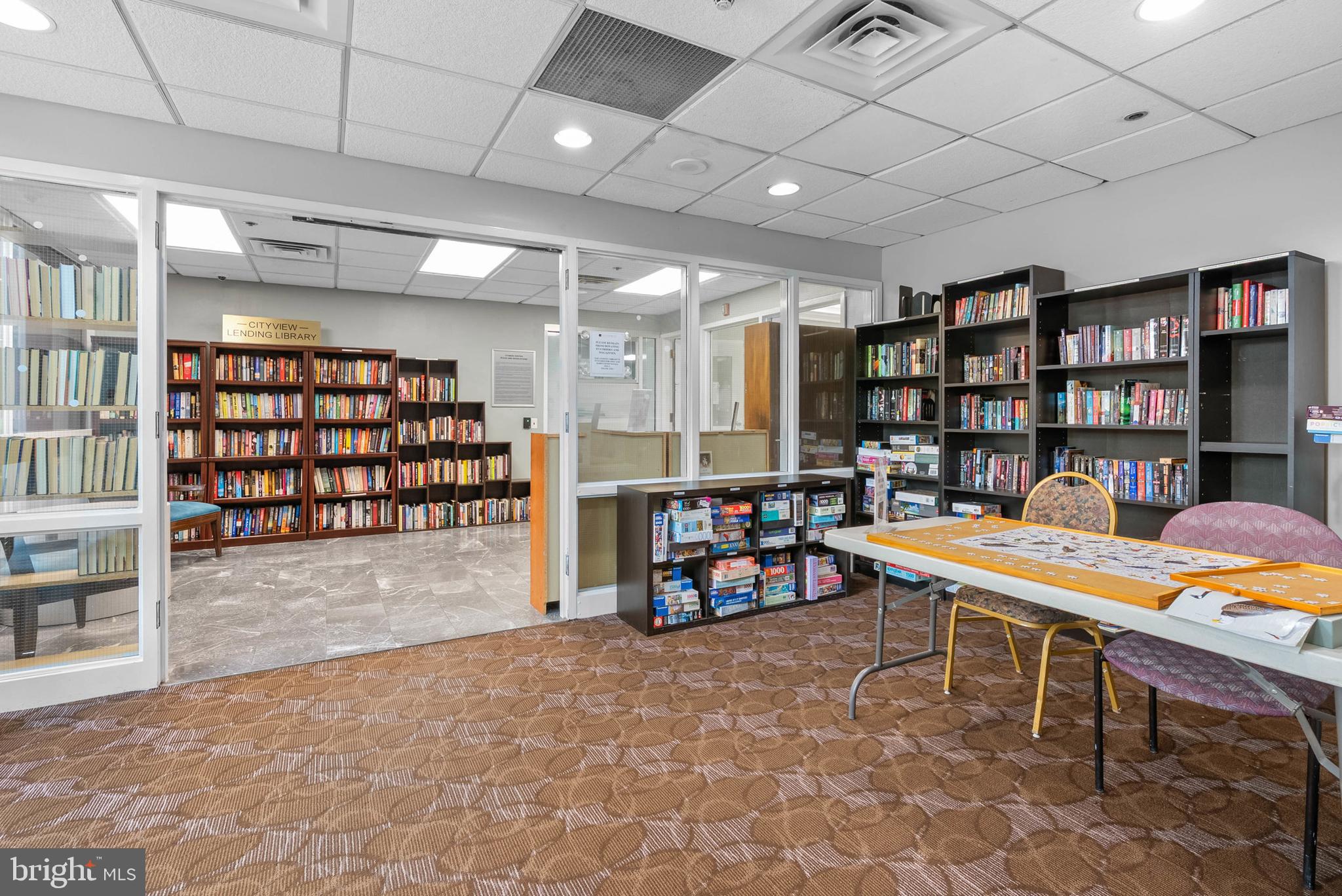2001 Hamilton Street, Unit 507 Philadelphia, PA 19130 - Photo 31 of 41 a room with furniture and a book shelf