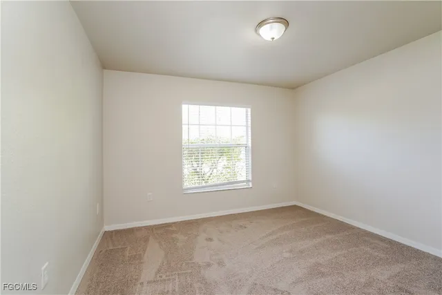 an empty room with a window