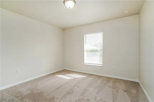 an empty room with a window