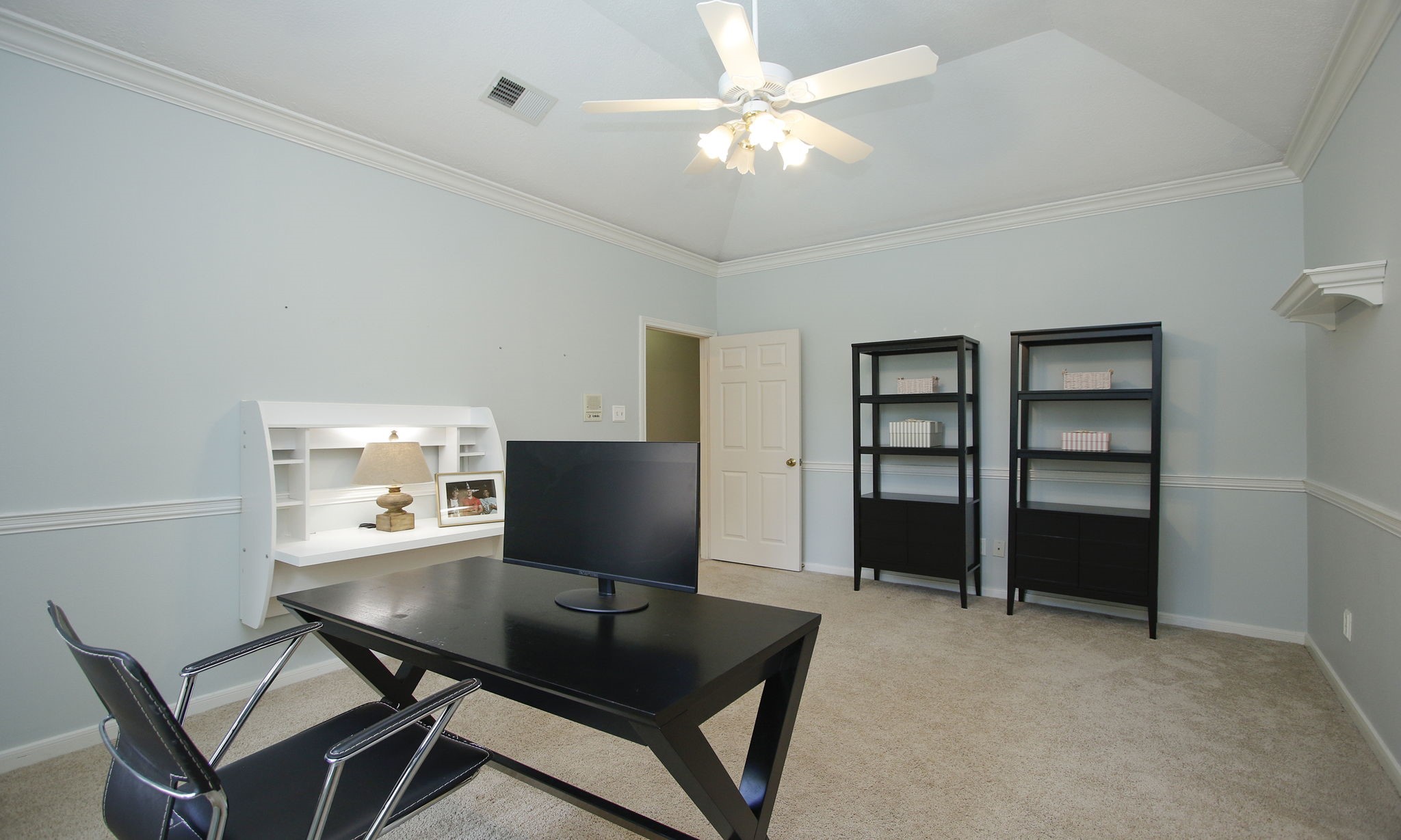15923 Harwick Drive Spring, TX 77379 - Photo 40 of 50 Need a quiet place to work, study, or create? This spacious secondary bedroom is currently used as a home office and enjoys convenient access to a Jack-and-Jill bathroom, offering flexibility for every stage of life