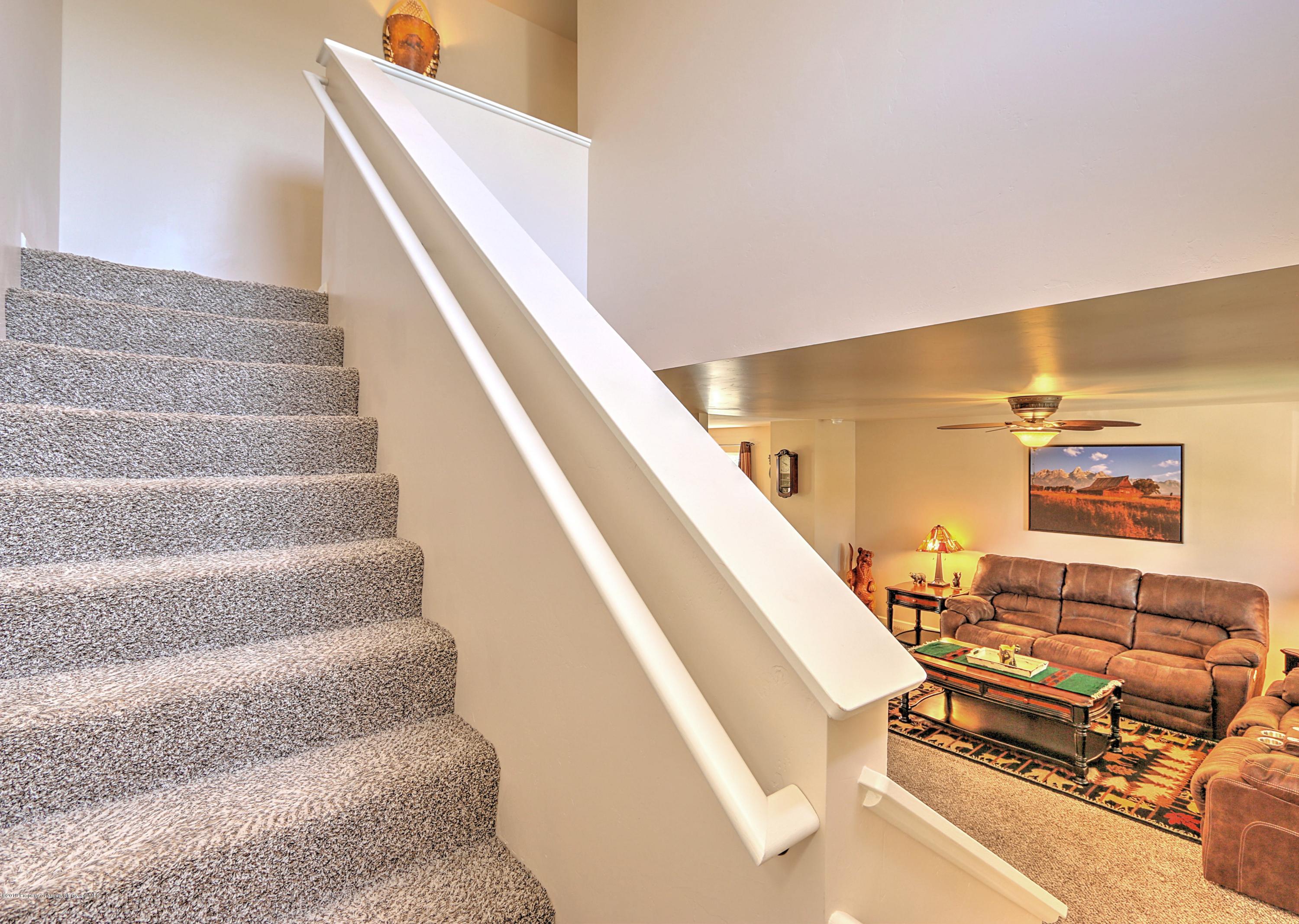 952 West 26th Street Rifle, CO 81650 - Photo 4 of 27 3.5 stairs going upstaris with view into