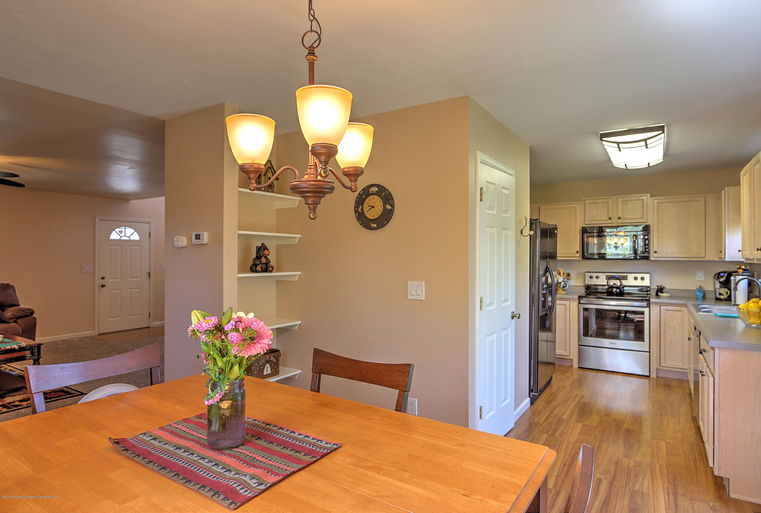 952 West 26th Street Rifle, CO 81650 - Photo 8 of 27 7 dining into kitchen