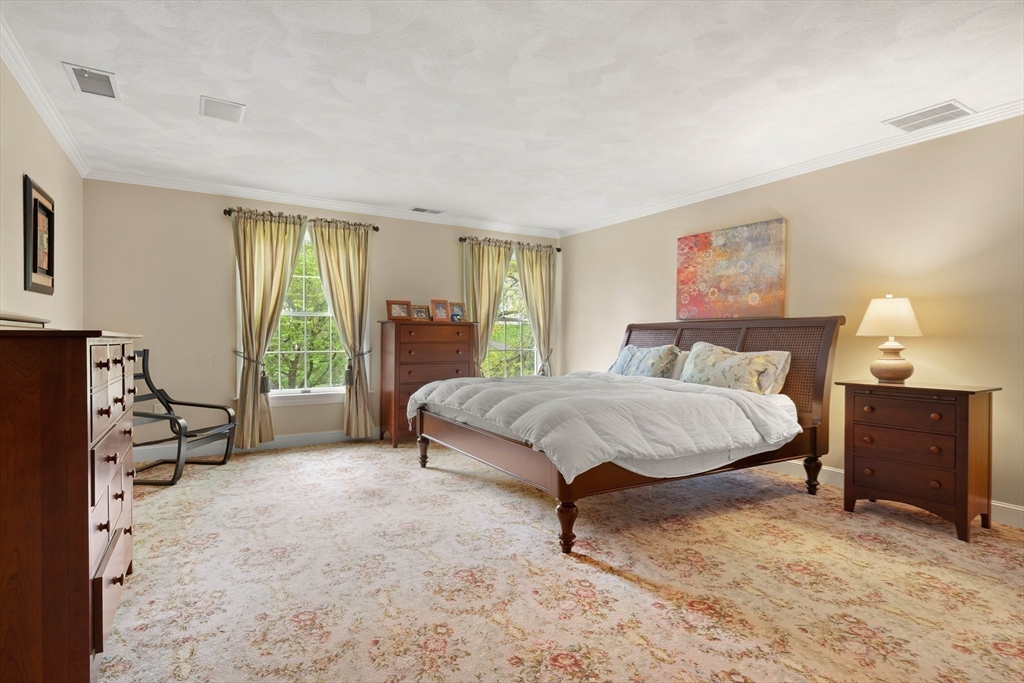 37 Old Planters Road Beverly, MA 01915 - Photo 25 of 42 a bedroom with a bed dresser and a window