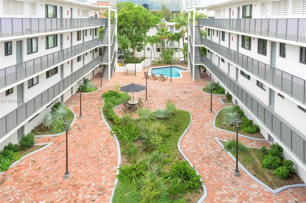 a view of a building with garden
