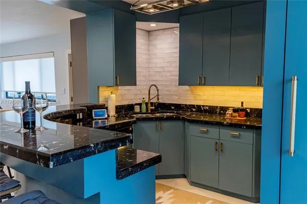 a kitchen with a sink and a cabinets