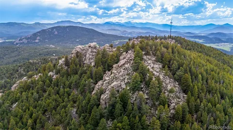 a view of a city with mountain