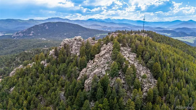 a view of a city with mountain