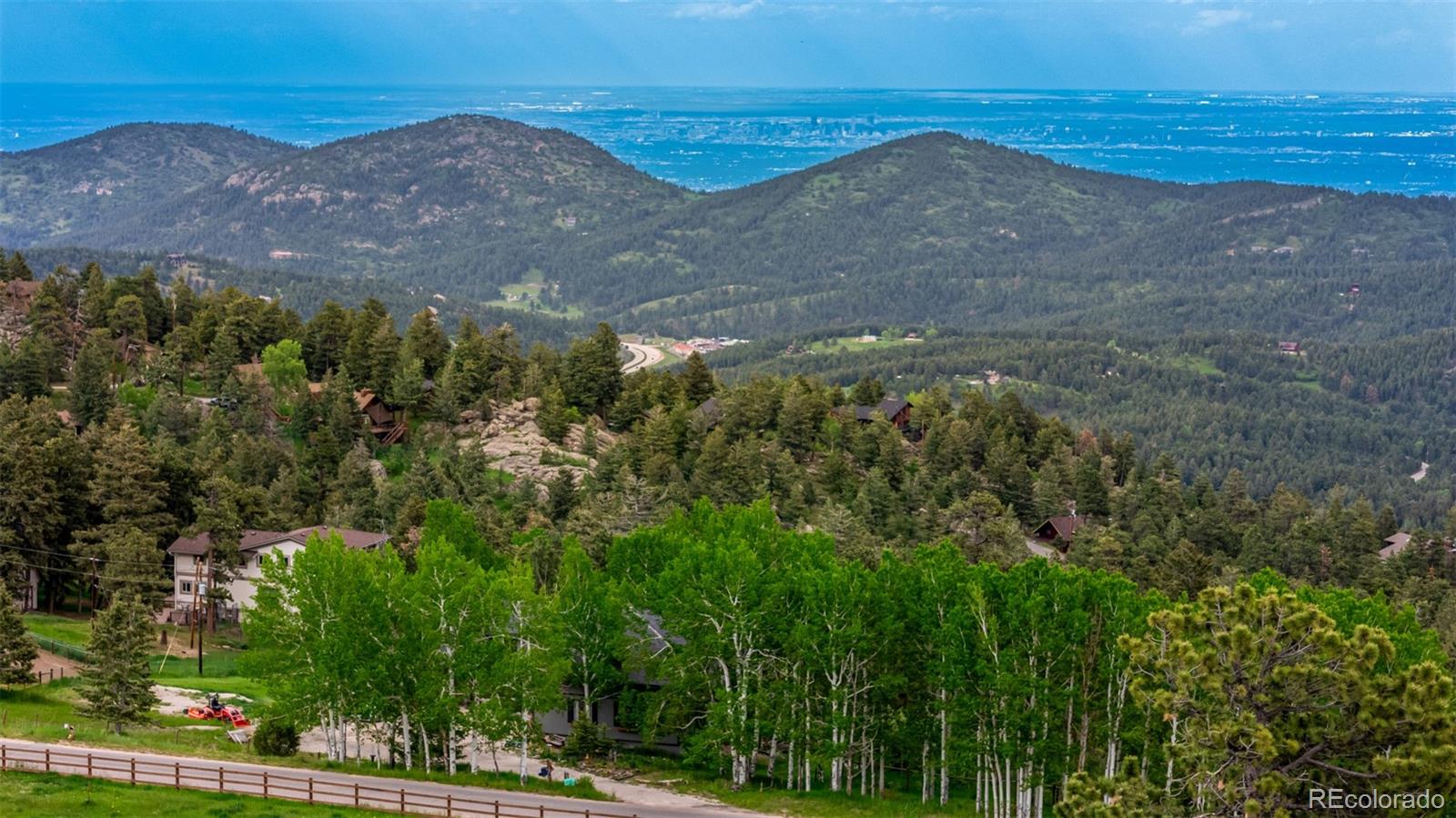 8537 Doubleheader Ranch Road Morrison, CO 80465 - Photo 33 of 48 a view of mountain with lake view
