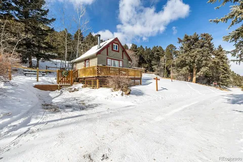 an aerial view of a house with garden