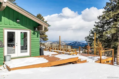 a view of city with palm trees