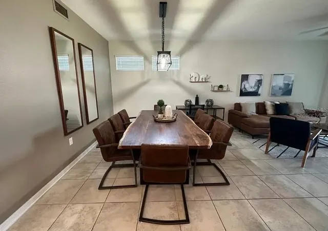 a view of a dining room with furniture