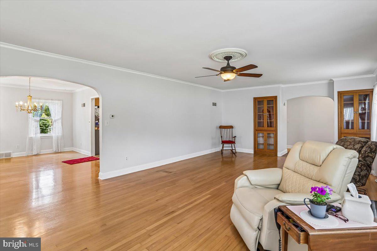 321 North 3rd Street Oakland, MD 21550 - Photo 12 of 48 a living room with furniture and wooden floor