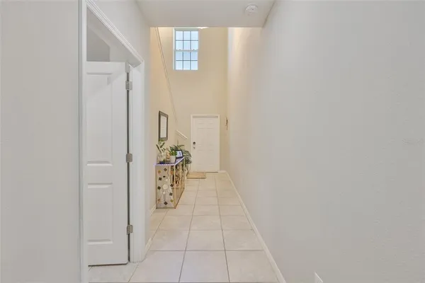 a view of an entryway with wooden floor