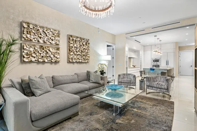 a living room with furniture and flat screen tv