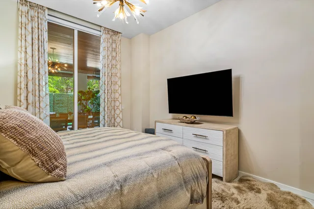 a view of a patio with couches and chairs