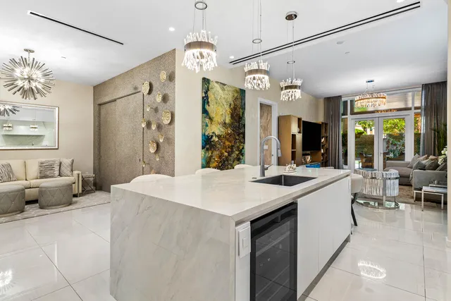 a kitchen with a table and chairs in it