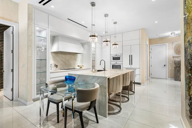a living room with fireplace furniture and a flat screen tv