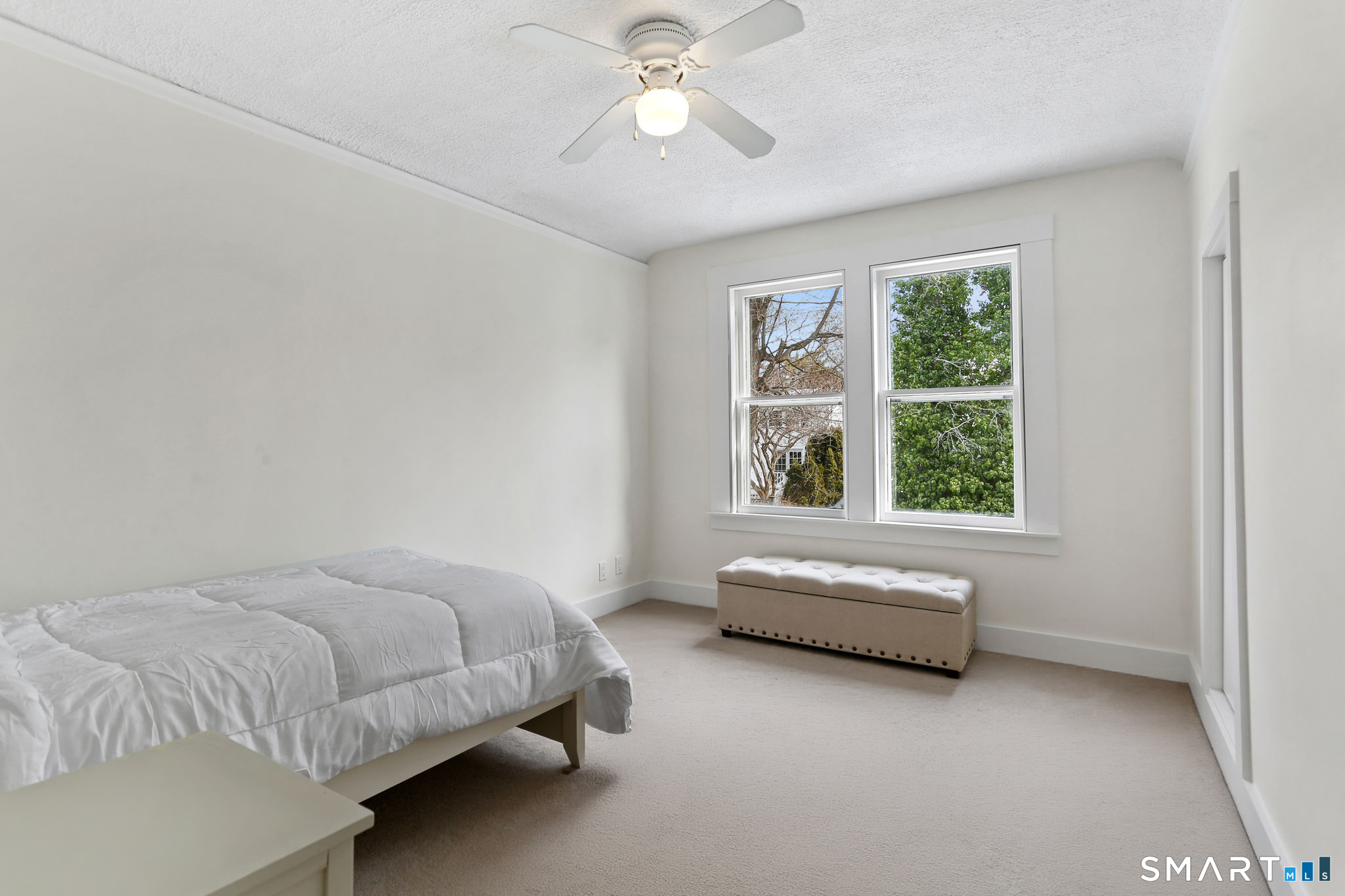 65 West Parish Road Westport, CT 06880 - Photo 11 of 32 Upper level bedroom. Hardwood floors under carpet