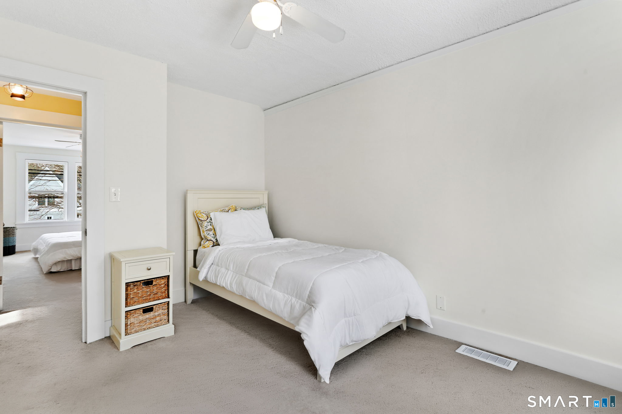 65 West Parish Road Westport, CT 06880 - Photo 12 of 32 Upper level bedroom. Hardwood floors under carpet