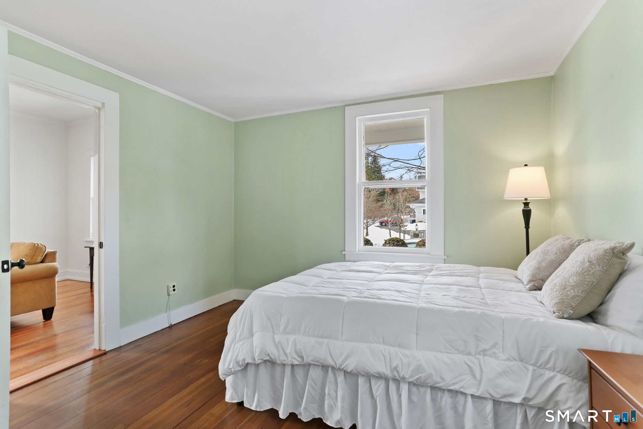 65 West Parish Road Westport, CT 06880 - Photo 21 of 32 En-suite bedroom on main level with fully renovated bathroom. Could be used as the primary BR