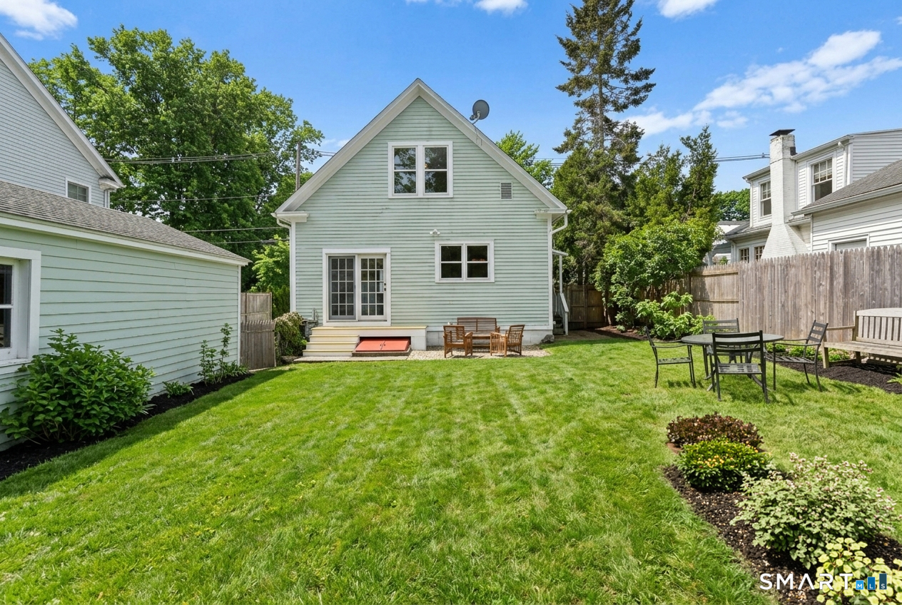 65 West Parish Road Westport, CT 06880 - Photo 6 of 32 Enjoy the spacious beautiful yard with deck and terrace