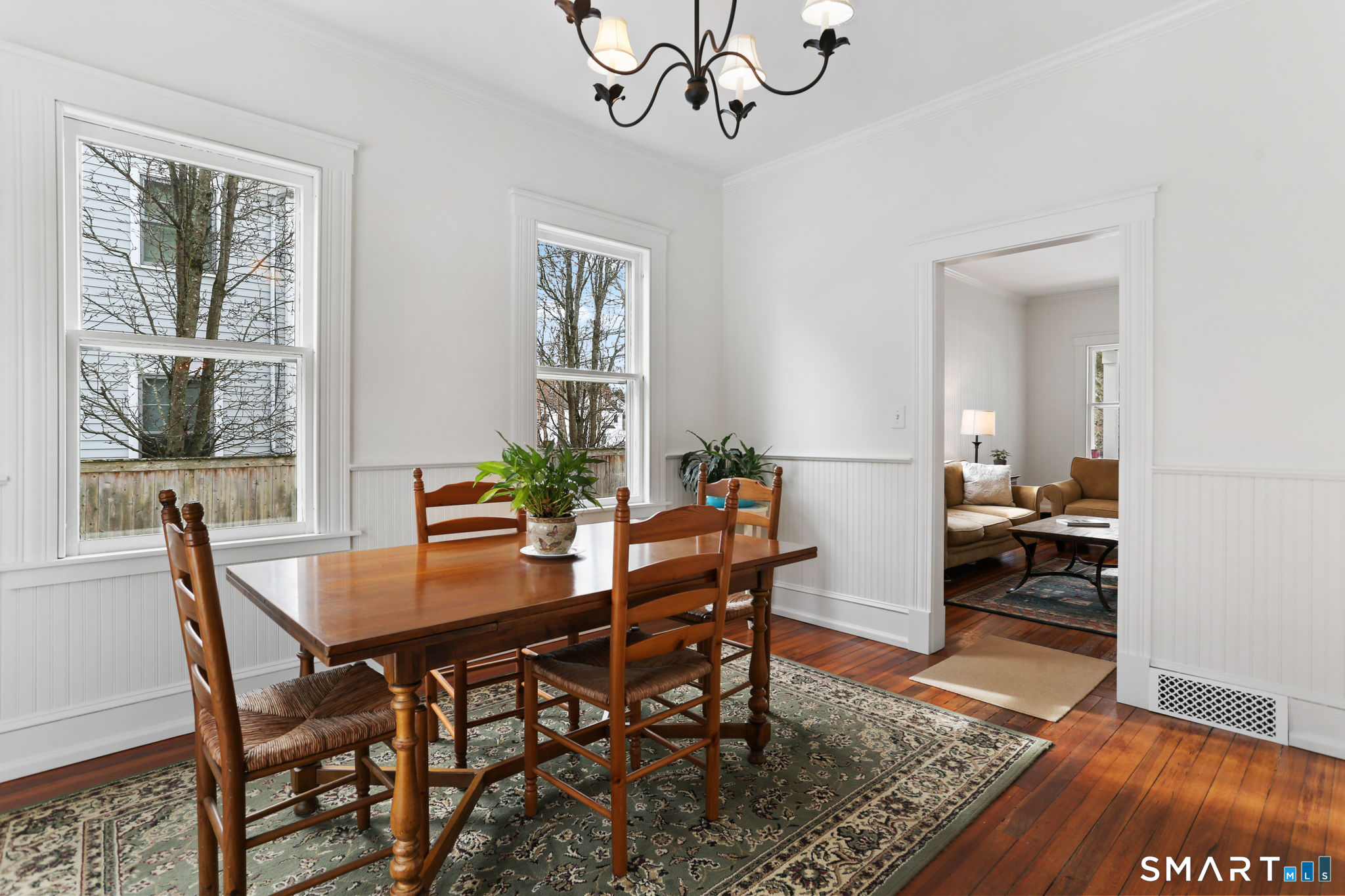 65 West Parish Road Westport, CT 06880 - Photo 8 of 32 Bright and sunny DR with doors to the deck and beautiful yard