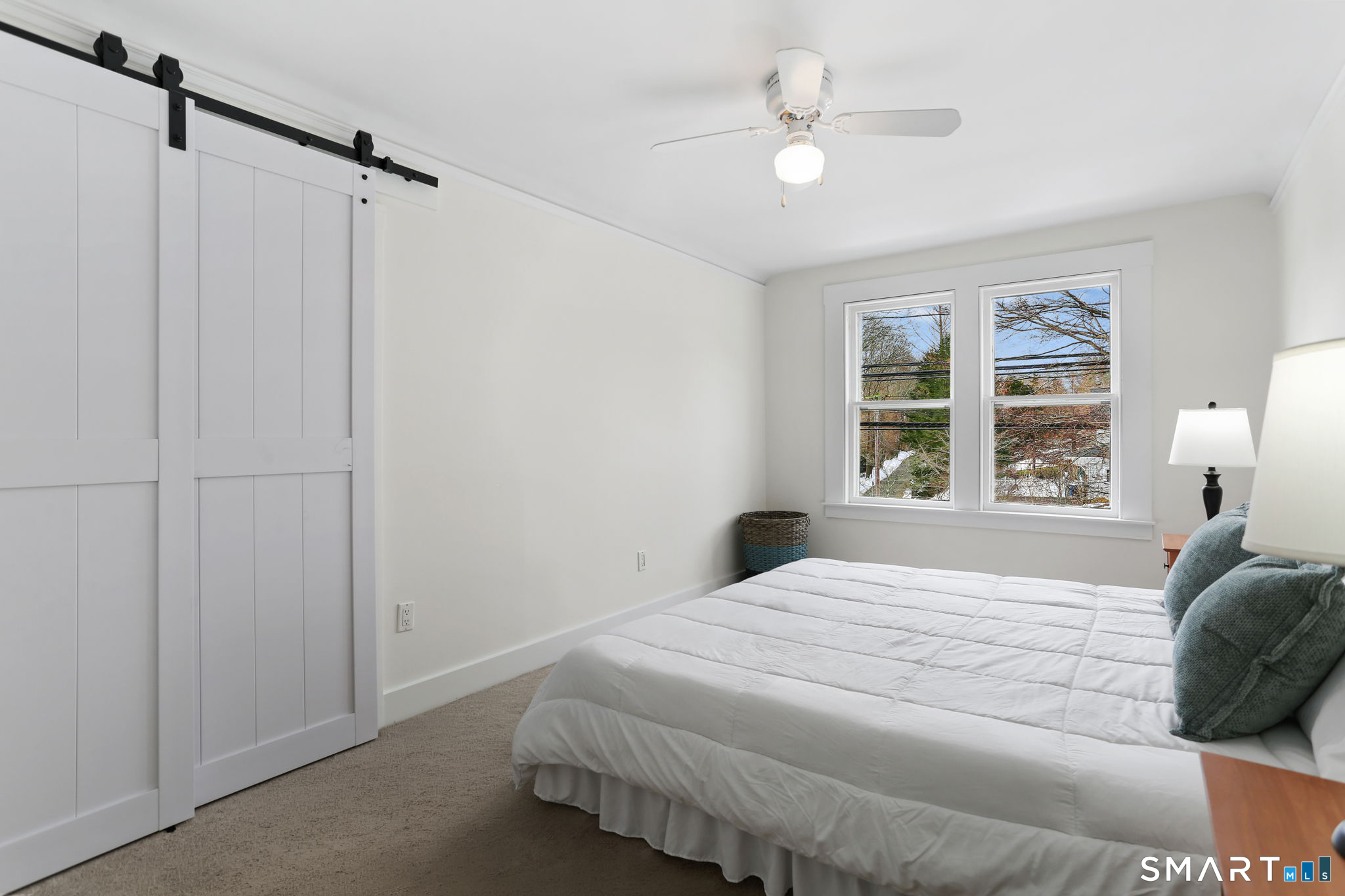 65 West Parish Road Westport, CT 06880 - Photo 10 of 32 Primary bedroom on upper level. Hardwood floors under carpet