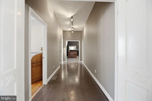 a view of a bedroom with furniture and staircase