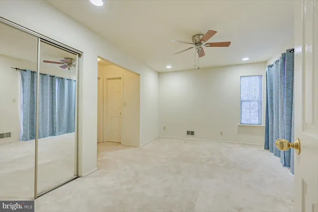 a bathroom with a sink a vanity and a mirror