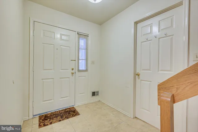 a view of a hallway with staircase