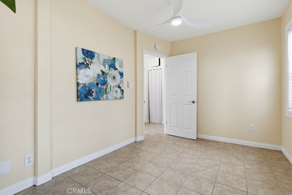 1104 Williamson Avenue Fullerton, CA 92833 - Photo 12 of 19 an empty room with painting on the wall