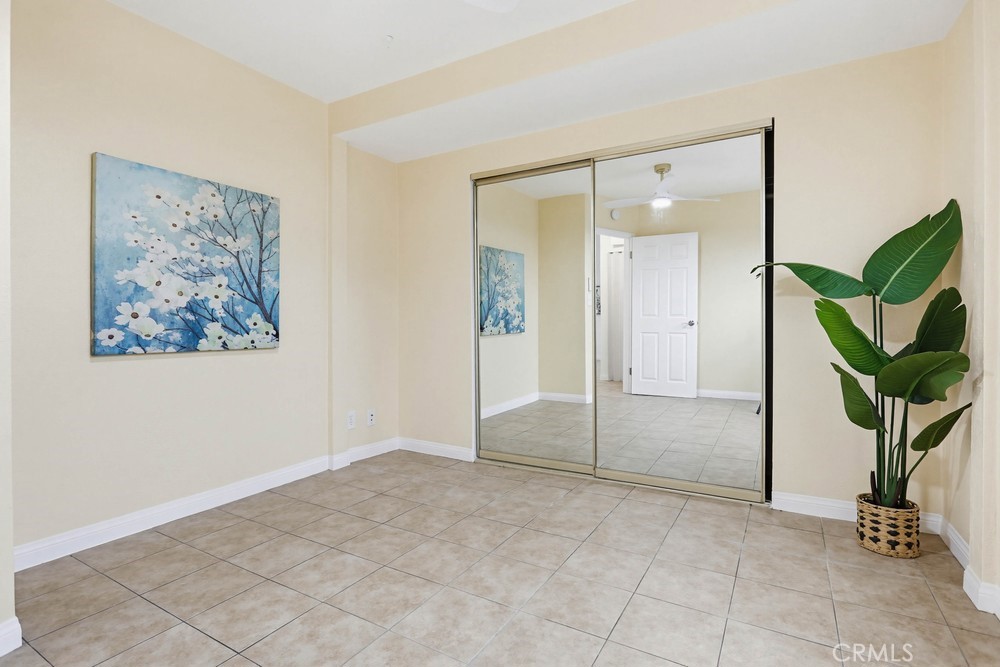 1104 Williamson Avenue Fullerton, CA 92833 - Photo 14 of 19 an empty room with window and potted plant