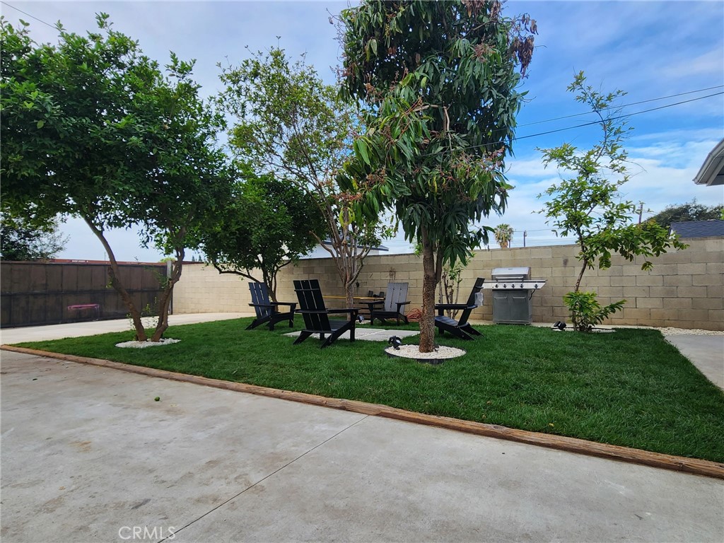 1104 Williamson Avenue Fullerton, CA 92833 - Photo 19 of 19 a view of backyard with large trees and plants