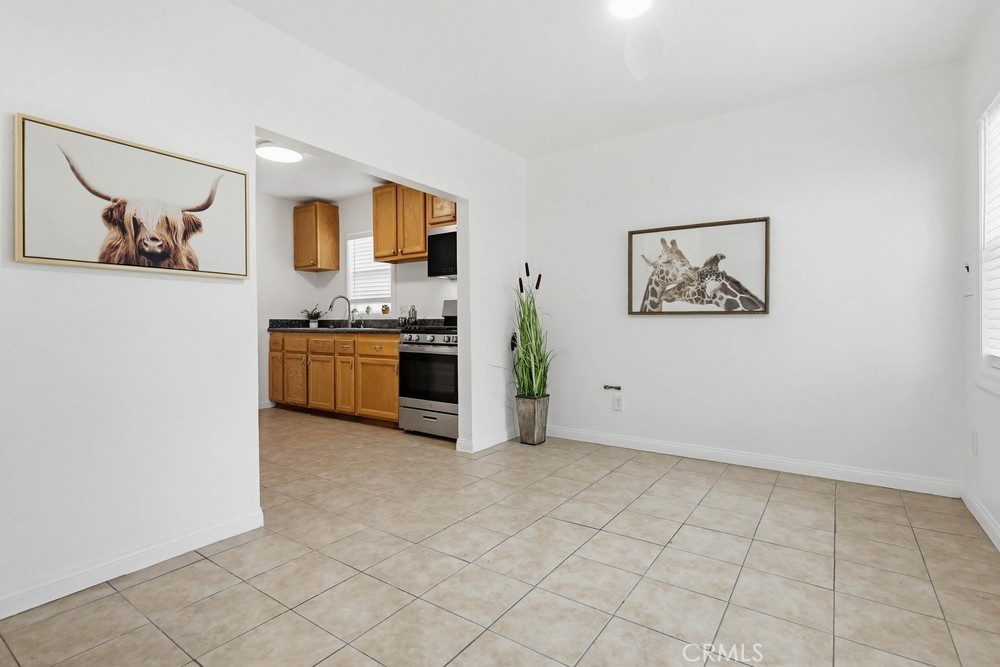 1104 Williamson Avenue Fullerton, CA 92833 - Photo 4 of 19 a view of a kitchen with microwave and cabinets