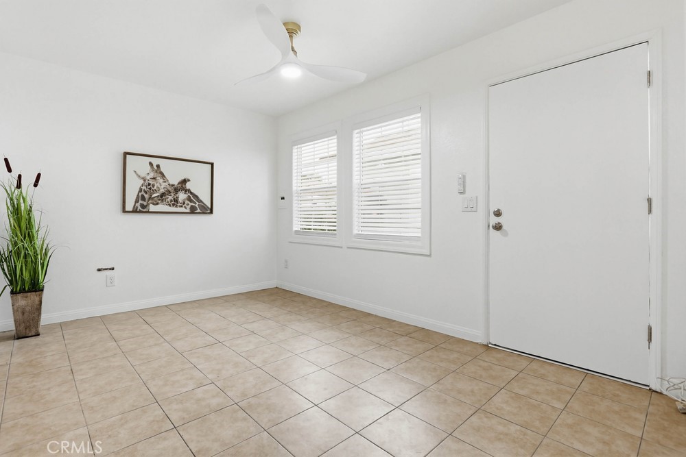 1104 Williamson Avenue Fullerton, CA 92833 - Photo 5 of 19 a view of an empty room with a window