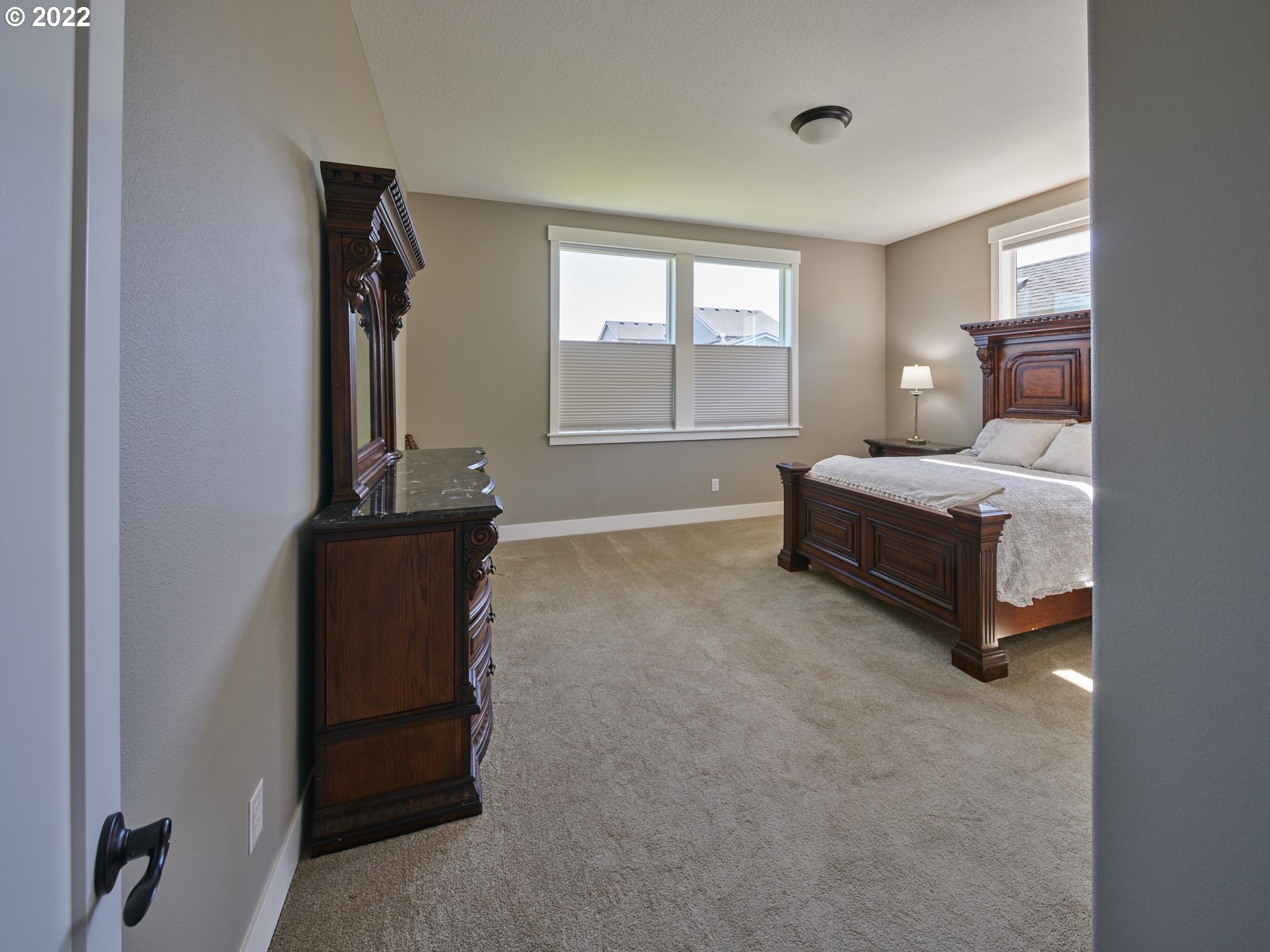 1638 South 46th Place Ridgefield, WA 98642 - Photo 12 of 29 a spacious bedroom with a bed and window